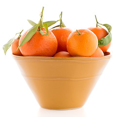 Image showing Tangerines on ceramic yellow bowl 