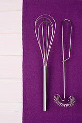 Image showing Kitchenware on purple towel