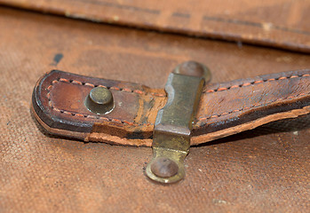 Image showing Old canvas trunk handle close up