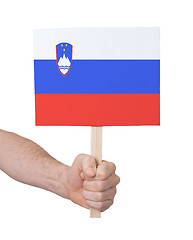 Image showing Hand holding small card - Flag of Slovenia