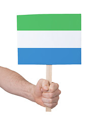 Image showing Hand holding small card - Flag of Sierra Leone