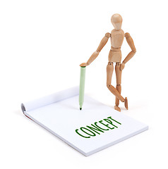 Image showing Wooden mannequin writing - Concept