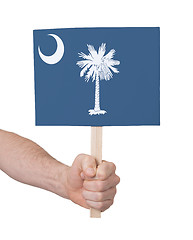 Image showing Hand holding small card - Flag of Oklahoma