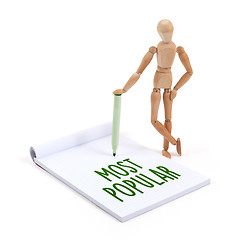 Image showing Wooden mannequin writing - Most popular