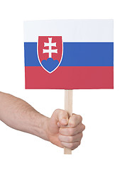 Image showing Hand holding small card - Flag of Slovakia