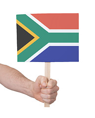 Image showing Hand holding small card - Flag of South Africa
