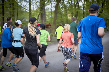 Image showing Young runners in the park