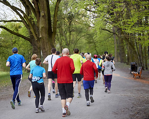 Image showing Young runners in the park