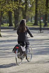 Image showing Woman on the bicycle in the park