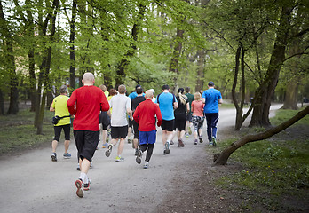 Image showing Young runners in the park