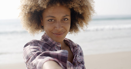 Image showing Happy Woman Giving Hand On Beach