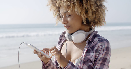 Image showing Girl On Beach Listening To Music
