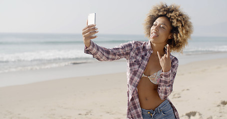 Image showing Young Woman Doing Selfie On The Beach