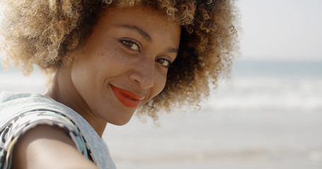 Image showing Young Girl Beckoning To Come