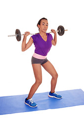 Image showing African American woman weight lifting.