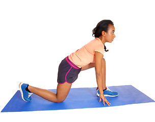 Image showing Young African American woman exercising.