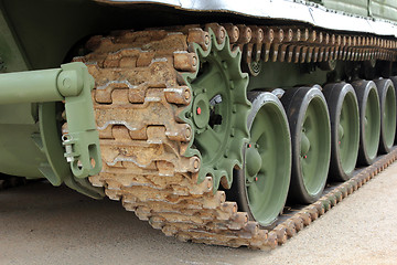 Image showing Part of the undercarriage of tracked military equipment, close-up