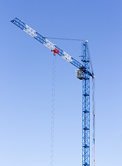 Image showing Industrial landscape with silhouettes of cranes on the sky backg