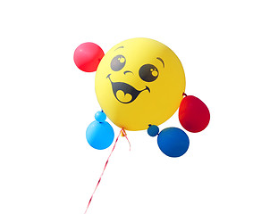 Image showing Yellow balloon flying on a white background