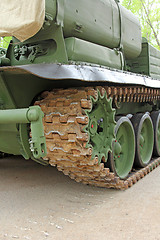 Image showing Part of the undercarriage of tracked military equipment, close-up