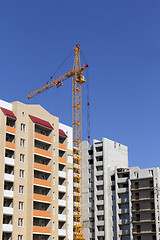 Image showing Industrial landscape, building crane against the blue sky