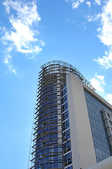 Image showing Modern glass silhouettes on modern building.