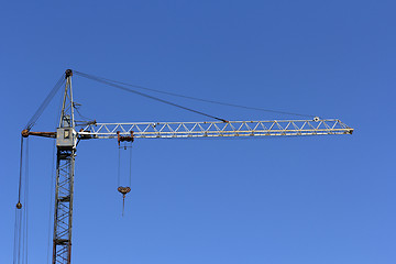 Image showing Industrial landscape, building crane against the blue sky