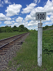 Image showing Mile post  railway with the number one hundred