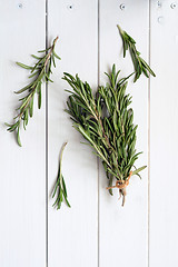 Image showing Rosemary on wooden background