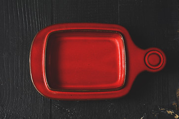 Image showing Empty plate on a dark wooden table