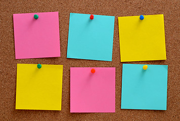 Image showing Blank notes pinned into brown corkboard