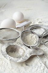 Image showing Kitchen utensils and wheat flour