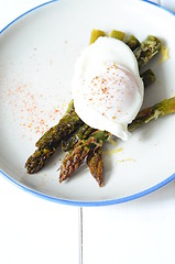 Image showing Green asparagus with poached egg