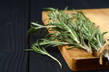 Image showing Rosemary on wooden background