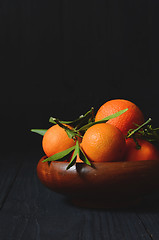 Image showing fresh mandarins with leafs