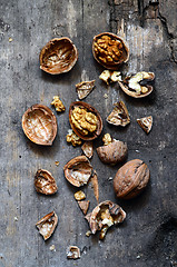 Image showing Walnuts on rustic old wooden table