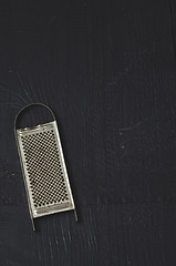 Image showing aged old rustic grater