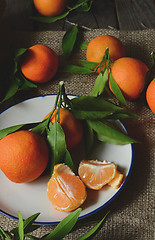 Image showing fresh mandarins with leafs