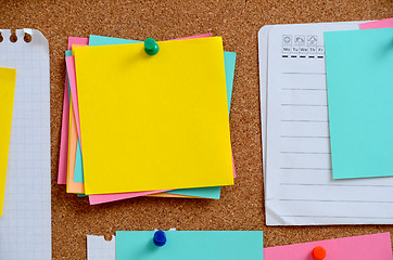 Image showing Blank notes pinned into brown corkboard