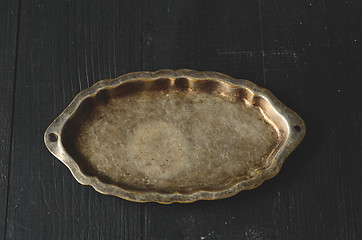 Image showing Empty plate on a dark wooden table