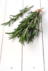 Image showing Rosemary on wooden background