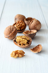 Image showing Walnuts on rustic old wooden table