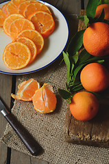 Image showing fresh mandarins with leafs