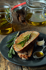 Image showing Fresh rosemary and olive oil