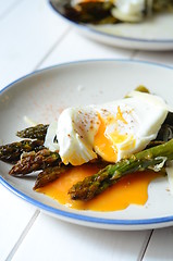 Image showing Green asparagus with poached egg