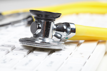 Image showing Stethoscope on the keyboard