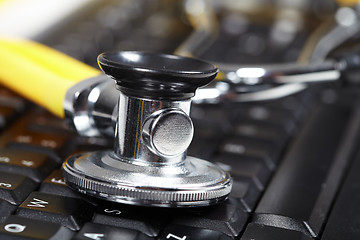 Image showing Stethoscope on the keyboard