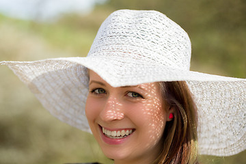 Image showing cheerful fashionable woman with hat