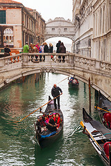 Image showing Gondola with tourists in Venice, Italy