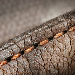 Image showing Close-up of old stiches in leather